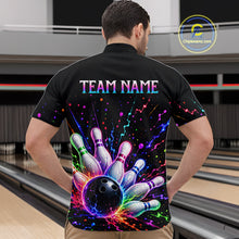 Load image into Gallery viewer, Person wearing a black bowling shirt with colorful design and 'TEAM NAME' text in a bowling alley.