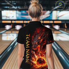 Load image into Gallery viewer, Person wearing a black t-shirt with a dragon design and 'Team Name' text in a bowling alley.