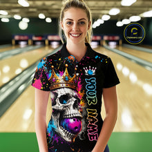 Load image into Gallery viewer, Woman wearing a colorful bowling shirt with a skull design in a bowling alley.