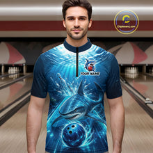 Load image into Gallery viewer, Man wearing a blue and black bowling shirt with shark design in a bowling alley.