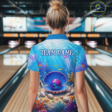 Load image into Gallery viewer, Person wearing a colorful bowling shirt with an ocean-themed design in a bowling alley.