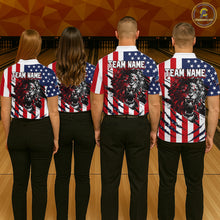 Load image into Gallery viewer, Four people wearing matching American flag-themed shirts with a lion graphic on a bowling alley.