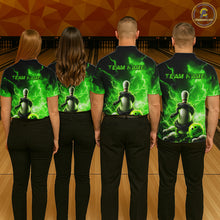 Load image into Gallery viewer, Four people wearing matching green shirts with a graphic design on a bowling alley.