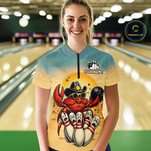Load image into Gallery viewer, Person wearing a shirt with a colorful design of a crab and bowling pins in a bowling alley.