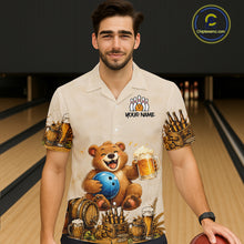 Load image into Gallery viewer, Man wearing a shirt with a bear bowling design in a bowling alley.