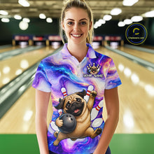 Load image into Gallery viewer, Woman wearing a colorful bowling shirt with a pug design in a bowling alley.