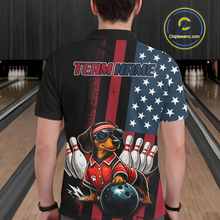 Load image into Gallery viewer, Person wearing a bowling-themed shirt with a dog graphic on a bowling alley.