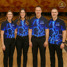 Load image into Gallery viewer, Four people wearing matching blue bowling shirts with a logo on a bowling alley.