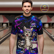 Load image into Gallery viewer, Man wearing a colorful bowling shirt with a cat design in a bowling alley.