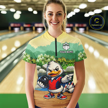 Load image into Gallery viewer, Person wearing a colorful bowling shirt with a cartoon character on a bowling alley.