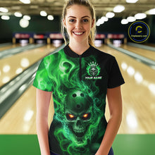 Load image into Gallery viewer, Women wearing a black bowling quarter zip shirt featuring a flaming skull with glowing orange eyes, green smoke effects, and custom “YOUR NAME” text.