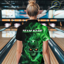 Load image into Gallery viewer, Women wearing a black bowling quarter zip shirt featuring a flaming skull with glowing orange eyes, green smoke effects, and custom “TEAM NAME” text.