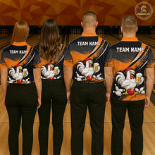 Load image into Gallery viewer, Four people wearing orange and black bowling polo featuring a chicken holding a beer mug, red bowling ball, scattered pins, and custom team name text.