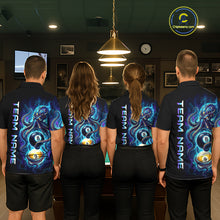 Load image into Gallery viewer, Four people wearing matching black shirts with colorful designs and text in a room.