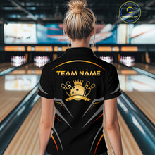 Load image into Gallery viewer, Person wearing a black bowling shirt with 'TEAM NAME' on the back in a bowling alley.