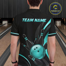 Load image into Gallery viewer, Person wearing a black bowling shirt with teal accents and 'TEAM NAME' text in a bowling alley.