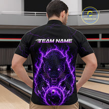 Load image into Gallery viewer, Person wearing a black t-shirt with a purple panther design on the back, standing in a bowling alley.