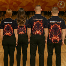 Load image into Gallery viewer, Four people wearing black shirts with a fiery bear design on a bowling alley background
