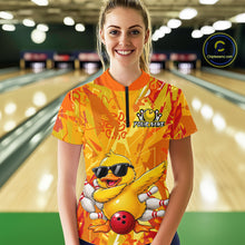 Load image into Gallery viewer, Person wearing a colorful bowling shirt with a duck design in a bowling alley.