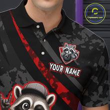 Load image into Gallery viewer, Black camouflage polo shirt with raccoon graphics and customizable text on a dark background