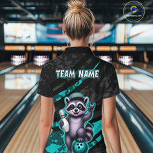 Load image into Gallery viewer, Person wearing a bowling shirt with a raccoon graphic and 'Team Name' text in a bowling alley.