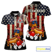 Load image into Gallery viewer, Polo shirt with American flag design and cartoon dog holding a hot dog and bowling ball, with 'Chiptee Amz' branding.