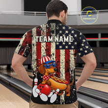 Load image into Gallery viewer, Man wearing a shirt with a dachshund hot dog graphic and 'TEAM NAME' text in a bowling alley.