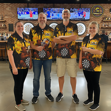 Load image into Gallery viewer, Four people wearing black and yellow darts polo featuring a bear drinking beer, dartboard graphics, and custom team and player name text.