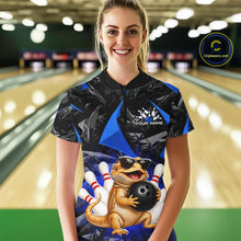 Load image into Gallery viewer, Women’s blue bearded dragon bowling quarter zip shirt, front view on female model in bowling lane 