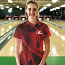 Load image into Gallery viewer, Woman wearing a red and black polo shirt with a logo and text in a bowling alley.