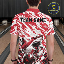 Load image into Gallery viewer, Person wearing a red and white polo shirt with a shark graphic and 'TEAM NAME' text at a bowling alley.
