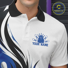 Load image into Gallery viewer, Close-up of the left chest on a white, black, and blue bowling polo shirt featuring a flaming bowling ball striking pins graphic.