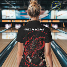 Load image into Gallery viewer, Back view of a female model in a bowling alley wearing a red custom quarter-zip bowling shirt featuring an aggressive dragon with flames in a dynamic and energetic design.