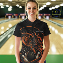 Load image into Gallery viewer, Front view of a happy female model in a bowling alley wearing an orange custom quarter-zip bowling shirt featuring an aggressive dragon with flames in a dynamic and energetic design.