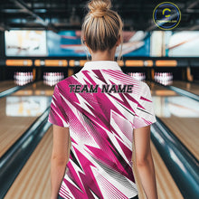 Load image into Gallery viewer, Person wearing a pink and white bowling shirt with 'TEAM NAME' text in a bowling alley.