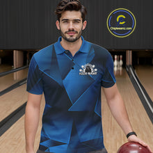 Load image into Gallery viewer, Man wearing a blue bowling shirt with a logo and text in a bowling alley.