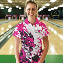 Load image into Gallery viewer, Woman wearing a pink and white bowling shirt with a dragon design in a bowling alley.