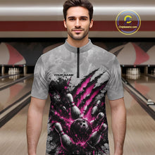 Load image into Gallery viewer, Front view of a male model wearing a gray bowling quarter zip shirt featuring a dramatic pink bowling ball and pins graphic with claw-mark artwork in a bowling lane.