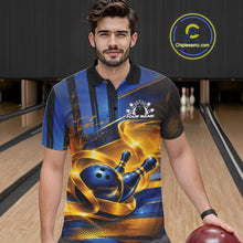Load image into Gallery viewer, Front view of a male model wearing a bowling polo shirt with a glossy blue bowling ball and pins wrapped in flowing gold ribbon accents inside a bowling lane.