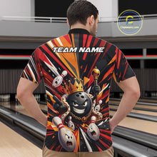 Load image into Gallery viewer, Front view of a male model wearing a black, red, and orange bowling quarter zip shirt featuring a crowned cartoon bowling ball holding a royal scepter with animated bowling pins and colorful burst graphics in a bowling lane.