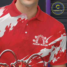 Load image into Gallery viewer, Close up front view of the left chest area on a red custom bowling polo shirt featuring a fierce yet funny crawfish bowling character and a distressed background design.