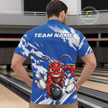 Load image into Gallery viewer, Back view of a male model in a bowling alley wearing a blue custom quarter zip bowling shirt with an aggressive crawfish bowling design and a distressed background.