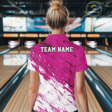 Load image into Gallery viewer, Person wearing a pink and white bowling shirt with 'TEAM NAME' on the back in a bowling alley.