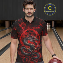 Load image into Gallery viewer, Front view of a male model in a bowling alley wearing a red custom bowling polo shirt featuring an ancient dragon, flames, and a moon-inspired bowling ball design.