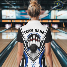 Load image into Gallery viewer, Female model shown from the back wearing a white, black, and blue bowling polo shirt with bowling ball striking pins artwork at a bowling lane.
