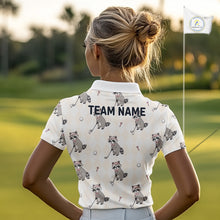 Load image into Gallery viewer, Person wearing a white polo shirt with raccoon patterns and 'TEAM NAME' text on a golf course.