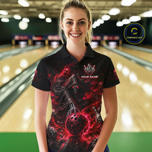 Load image into Gallery viewer, Person wearing a black t-shirt with a red and black design and 'TEAM NAME' text in a bowling alley.