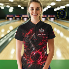 Load image into Gallery viewer, Woman wearing a black bowling shirt with red and black design in a bowling alley.