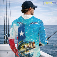 Load image into Gallery viewer, Angler wearing Texas Bass Fishing Long Sleeve Hooded Fishing Shirt while fishing on the water with personalized name