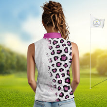 Load image into Gallery viewer, Woman wearing a sleeveless shirt with a leopard print pattern on a golf course.